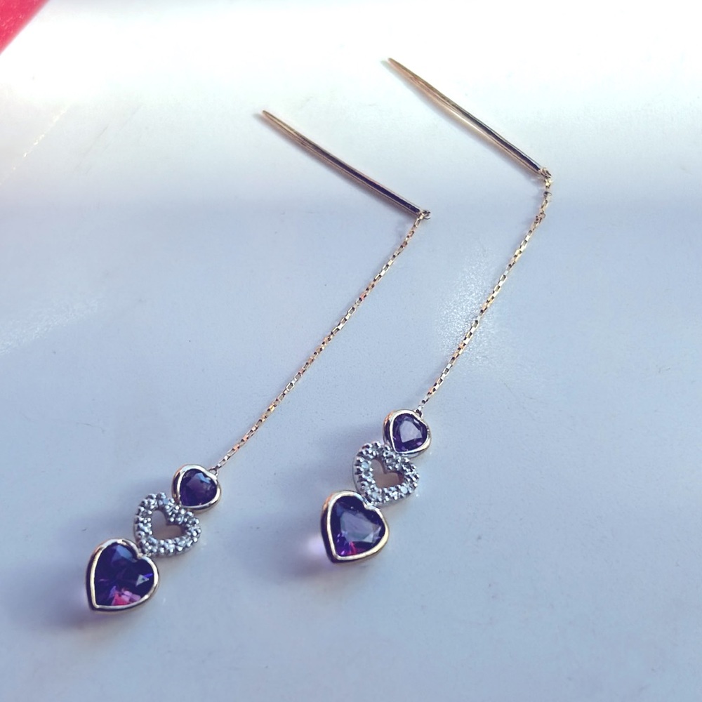 Solid gold amethyst and diamonds dangling earrings.